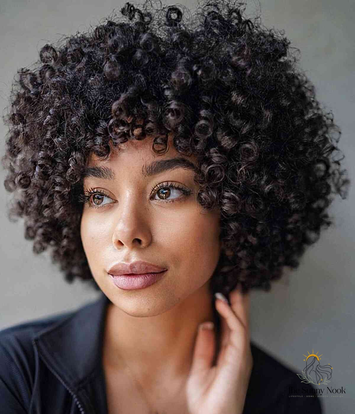 27 Hairstyles For Curly Hair Short Perfect for Your Next Salon Appointment 14 Big Curls for Short Tresses
