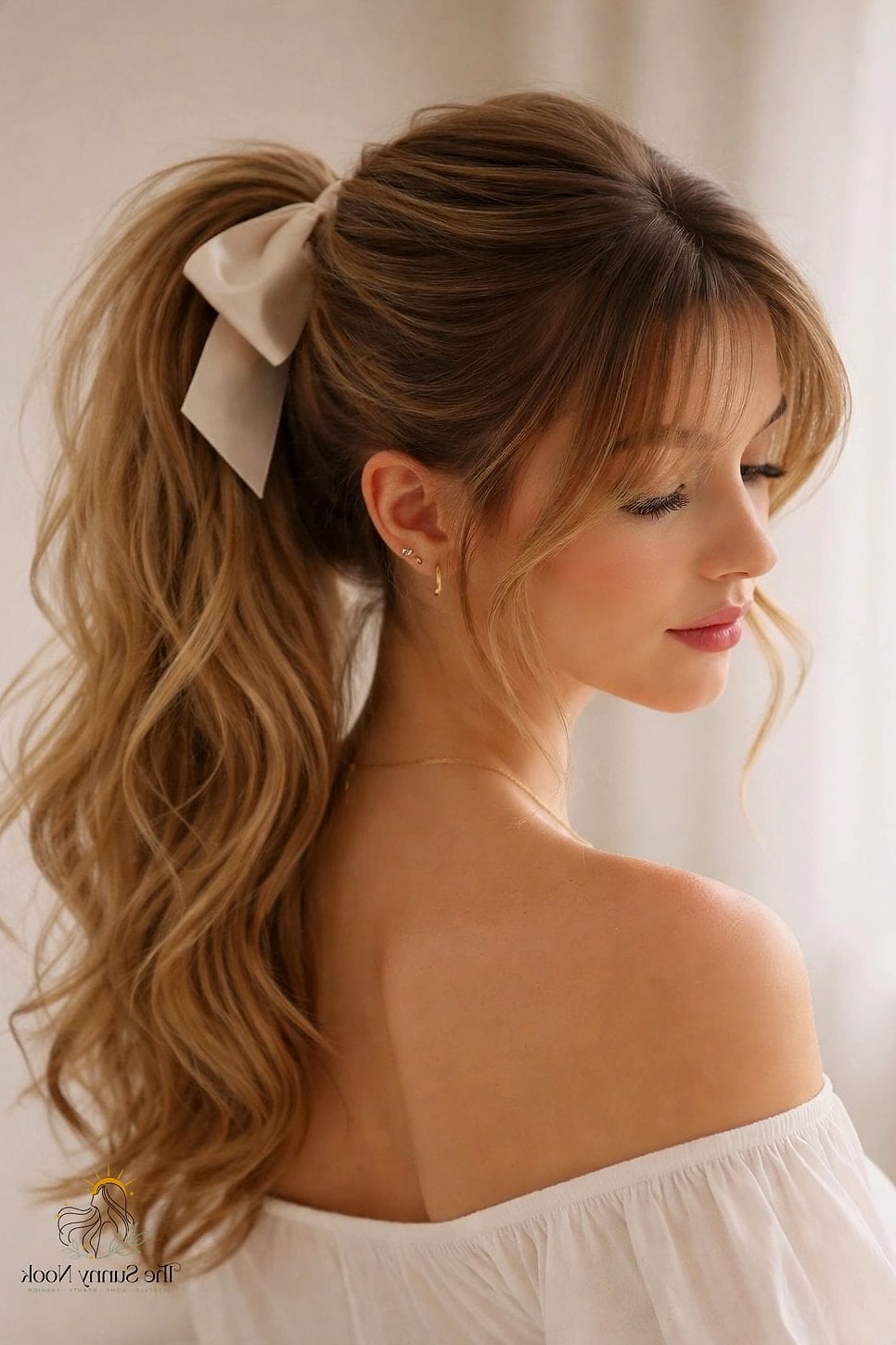 25 Cute Hairstyles With A Bow Everyone Is Pinning Right Now 21 Bow Ponytail With Curtain Bangs