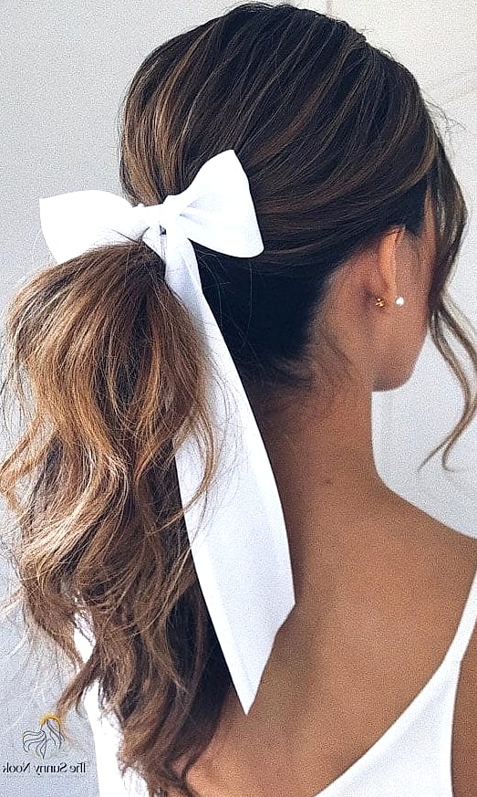 25 Cute Hairstyles With A Bow Everyone Is Pinning Right Now 9 Bow On A Side Ponytail