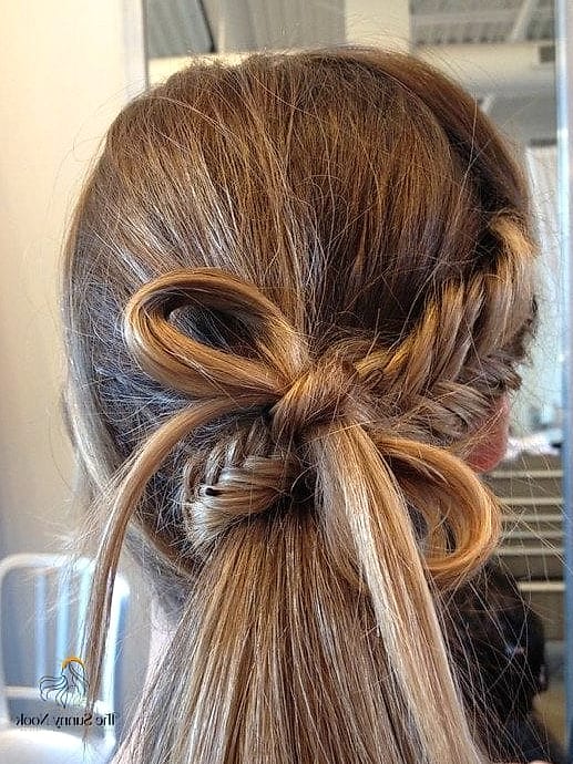 25 Cute Hairstyles With A Bow Everyone Is Pinning Right Now 13 Bow-Wrapped Fishtail Ponytail