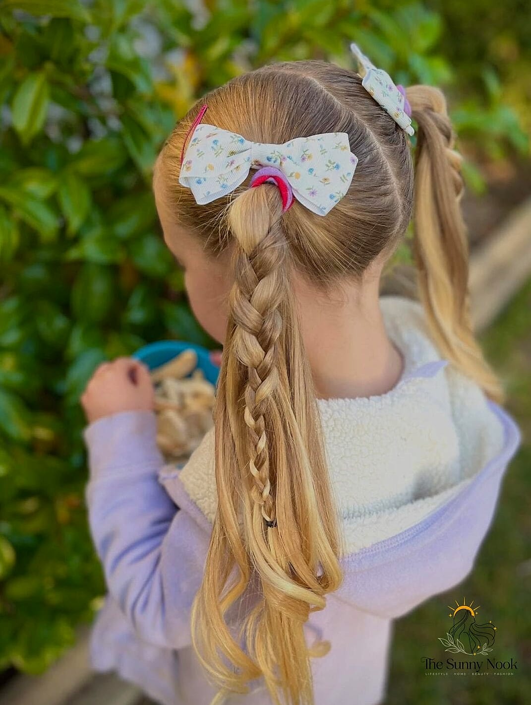 7 Cute Hairstyles With Bows for When You Need a Fresh Change 4 Braided Pigtails With Bows