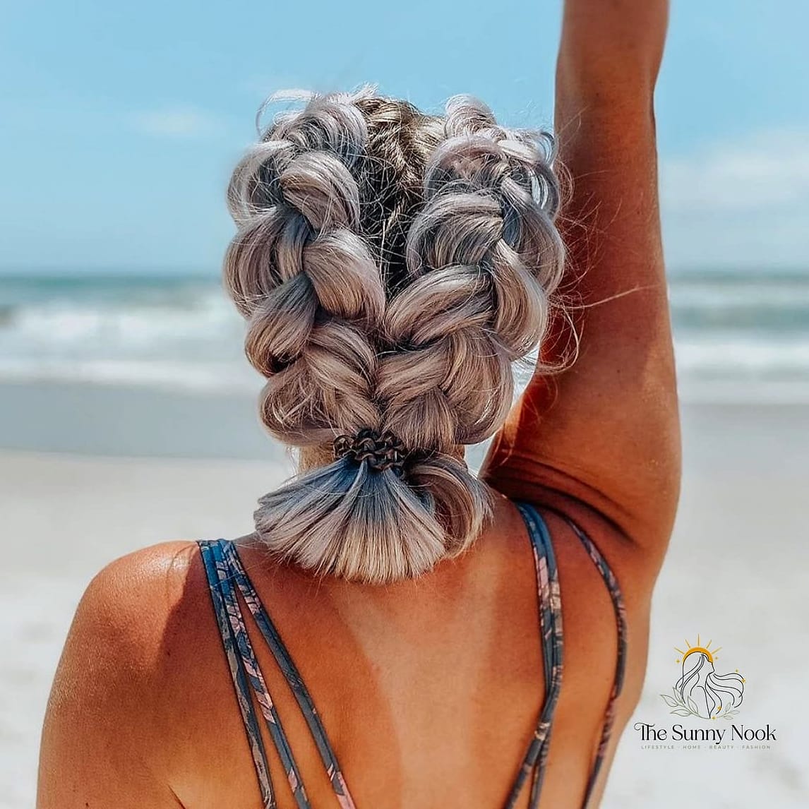 22 Easy Beach Hairstyles That Are Actually Easy to DIY 7 Braided Top Knot
