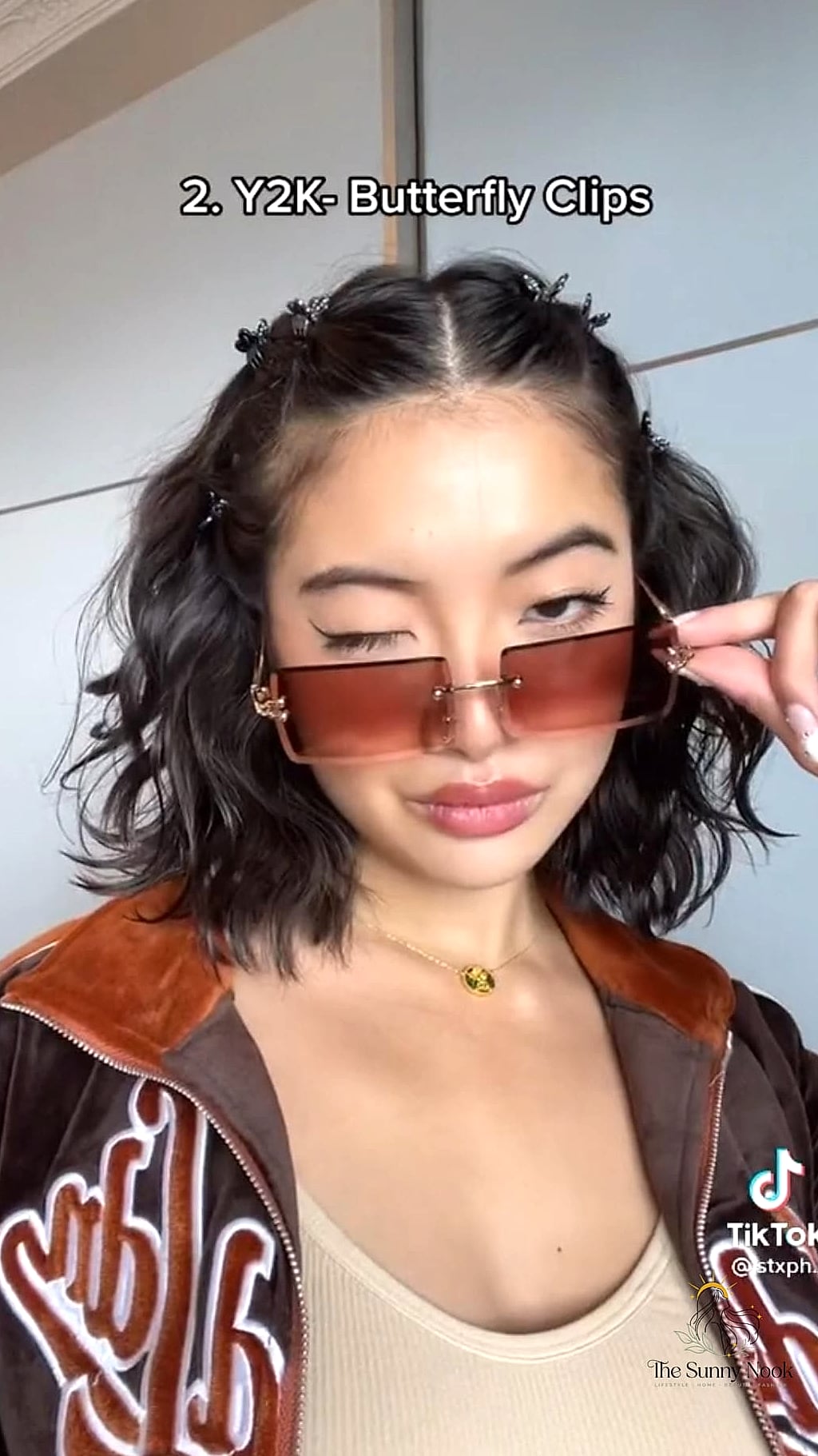 21 Cute Y2K Hairstyles Inspo That's Giving Us Everything 2 Butterfly Clip Half-Up