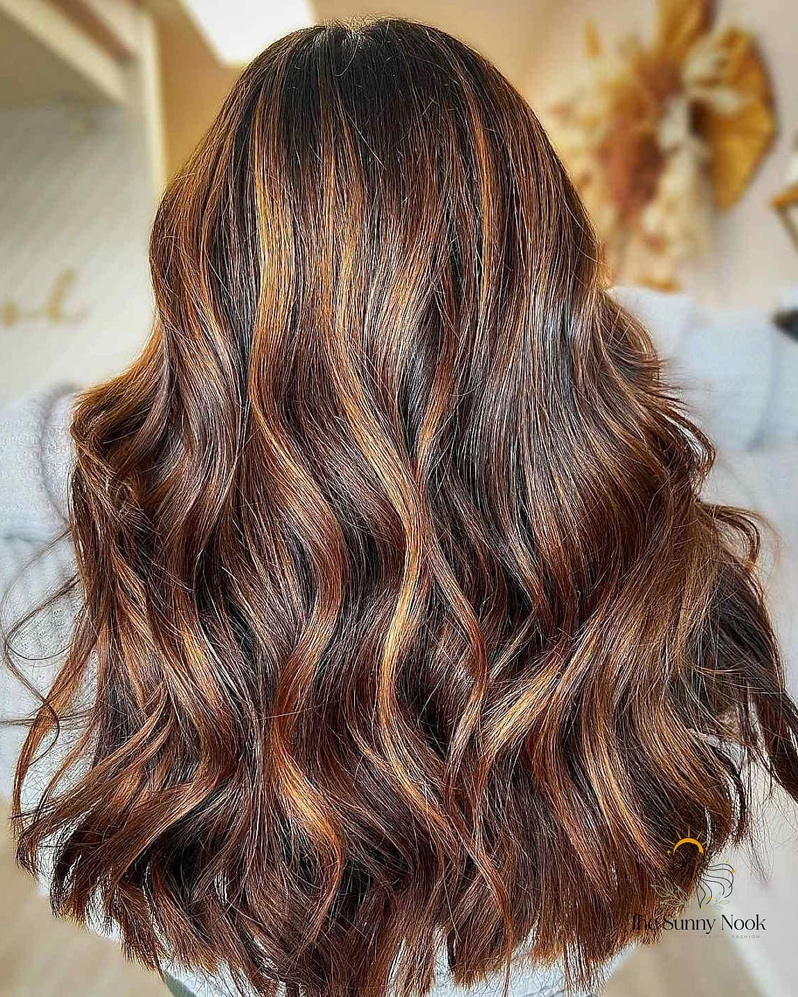 Caramel Highlights on a Curly Bob