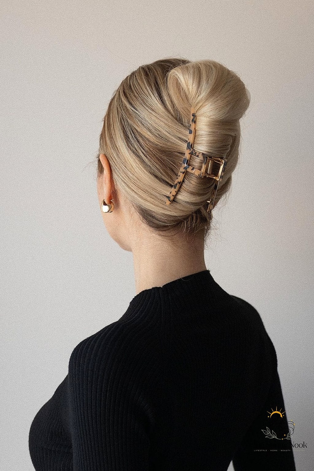 10 Easy Claw Clip Hairstyles We're Obsessed With Right Now 6 Classic French Twist with a Claw Clip
