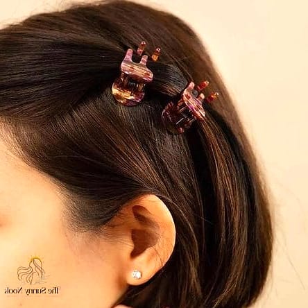 Claw Clip Space Buns for a Playful Look
