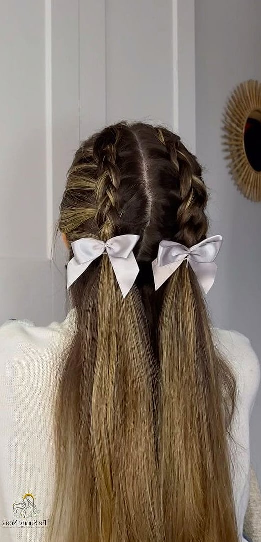 25 Cute Hairstyles With A Bow Everyone Is Pinning Right Now 10 Coquette-Style Double Bows On Pigtails