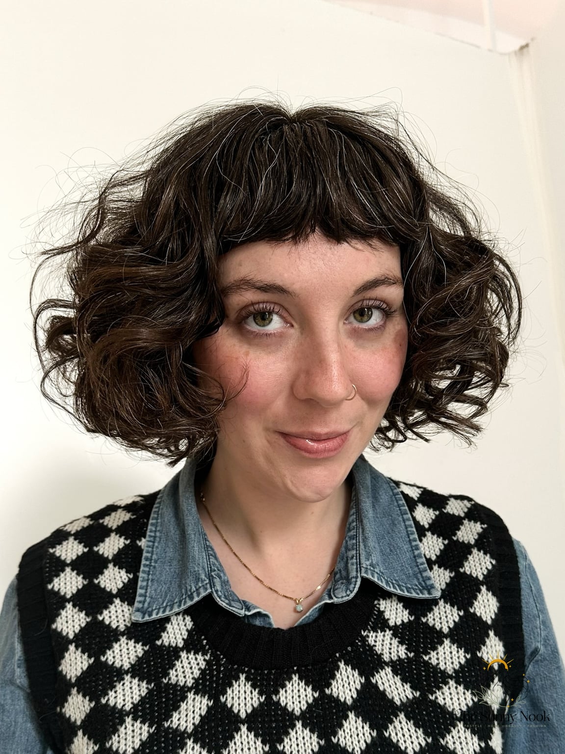 27 Hairstyles For Curly Hair Short Perfect for Your Next Salon Appointment 9 Curly Bob with a Micro Fringe for the Bold