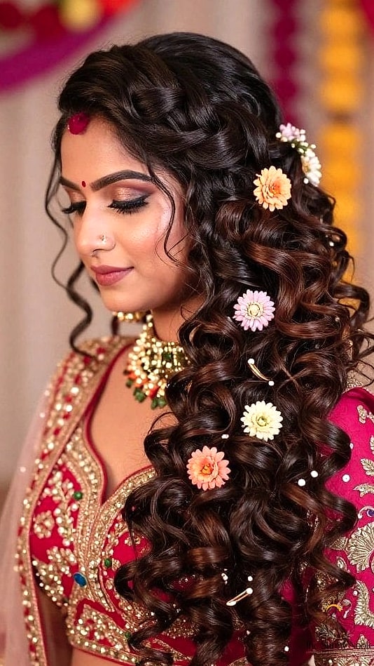 20 Indian Wedding Guest Hairstyles Inspo That's Giving Us Everything 11 Curly Hair Half-Up with Curl-Defining Twists