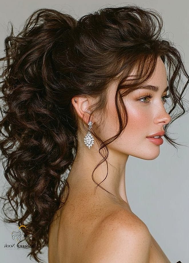 21 Simple Ponytail Hairstyles to Show Your Stylist ASAP 9 Curly High Pony