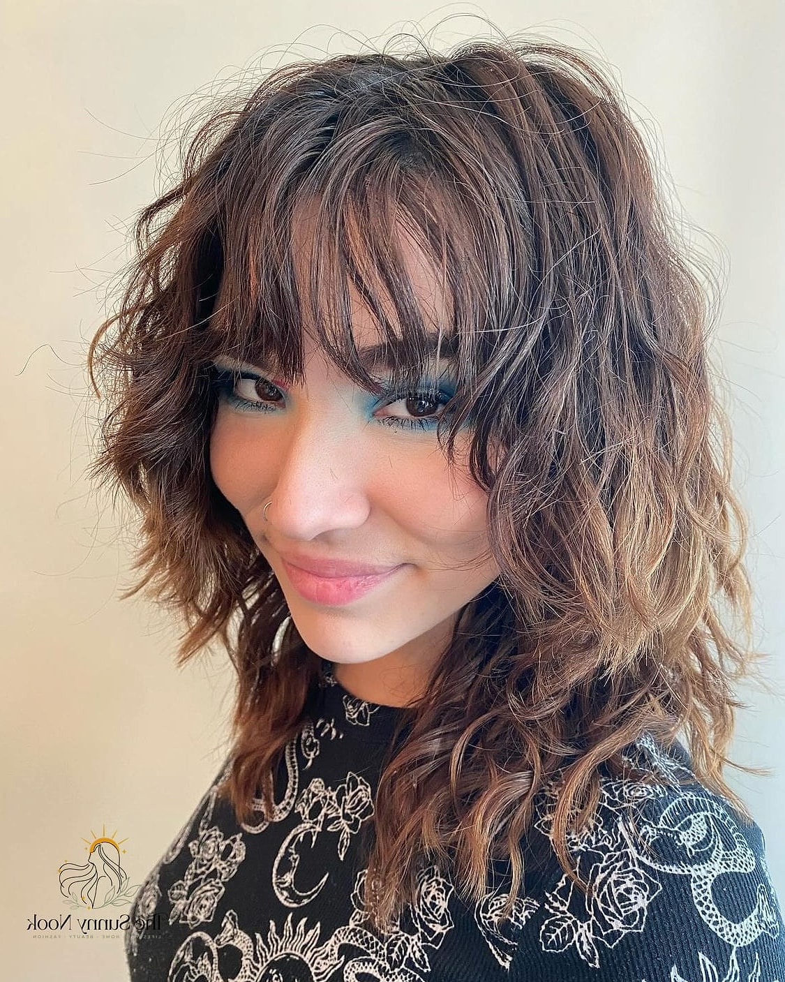 23 Cute Hat Hairstyles That Are Trending on Pinterest This Week 14 Curly Shag With a Bucket Hat