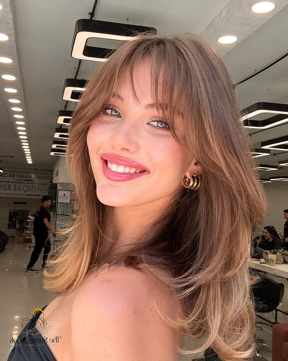 16 Professional Hairstyles For Work That Prove This Trend Is Here to Stay 12 The Curtain Bangs With Long Layers