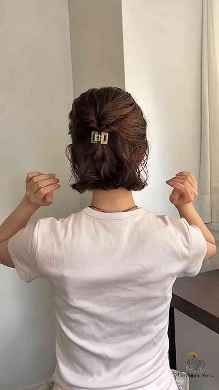 Elegant Claw Clip Updo with Floral Accent