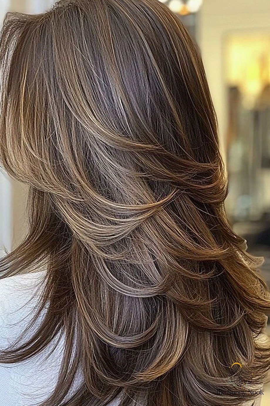 Feathered Layers with Curtain Bangs