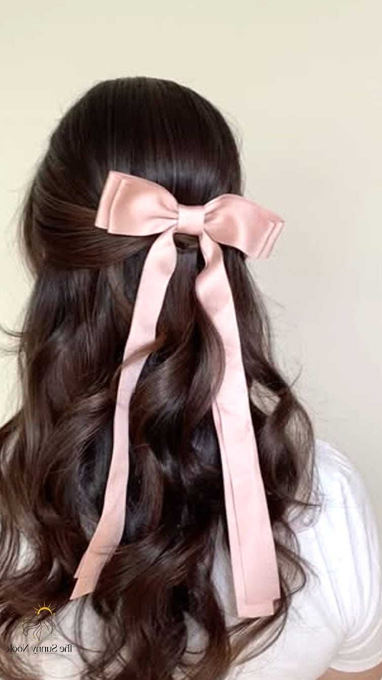 7 Cute Hairstyles With Bows for When You Need a Fresh Change 3 Half-Up Bow Style