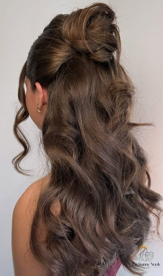 11 Prom Hairstyles Bun for When You Need a Fresh Change 8 Half-Up Bun with Loose Waves
