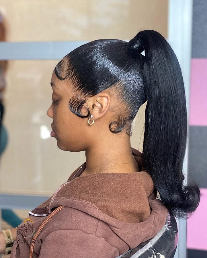 25 Frontal Ponytail Hairstyles That Belong on Your Inspiration Board 7 Half-Up Frontal Pony with Loose Waves