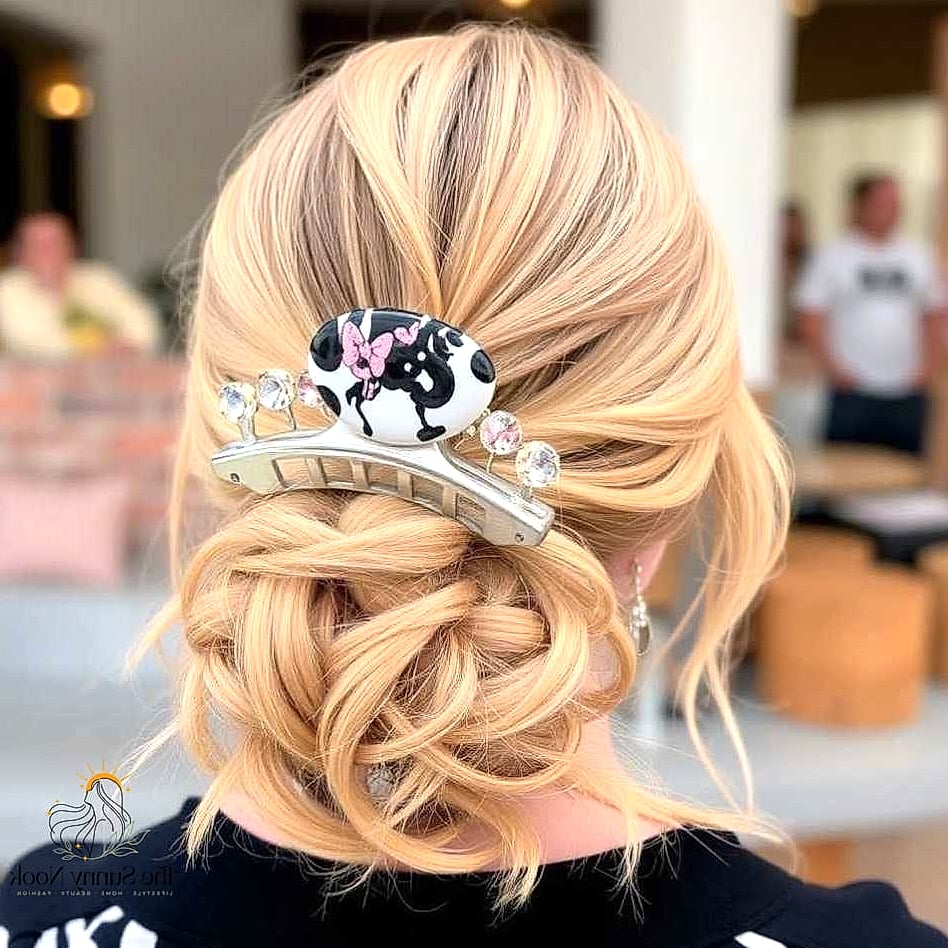 10 Easy Claw Clip Hairstyles We're Obsessed With Right Now 9 High Bubble Bun with a Claw Clip