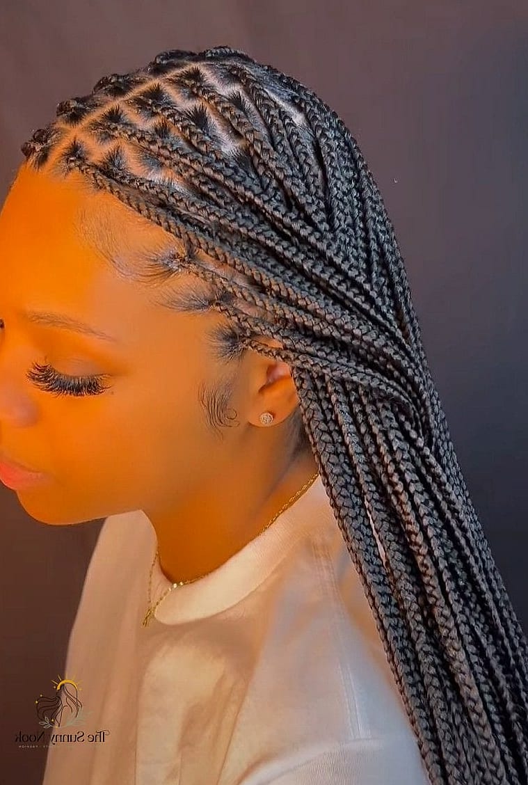 27 Easy Hairstyles Black Women Perfect for Your Next Salon Appointment 13 Knotless Braids with Middle Part