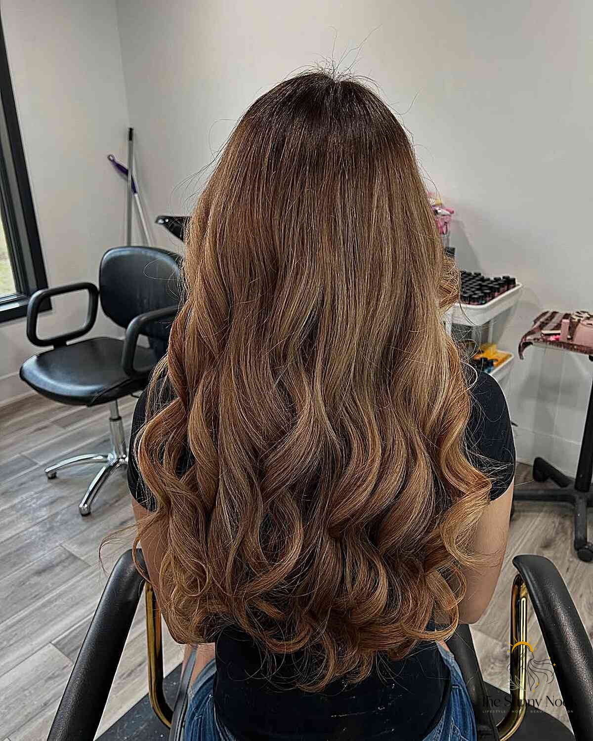 17 Long Thick Hair Hairstyles That Are Both Cute and Low Maintenance 12 Long Wavy Thick Hair with Rich Color Dimensions