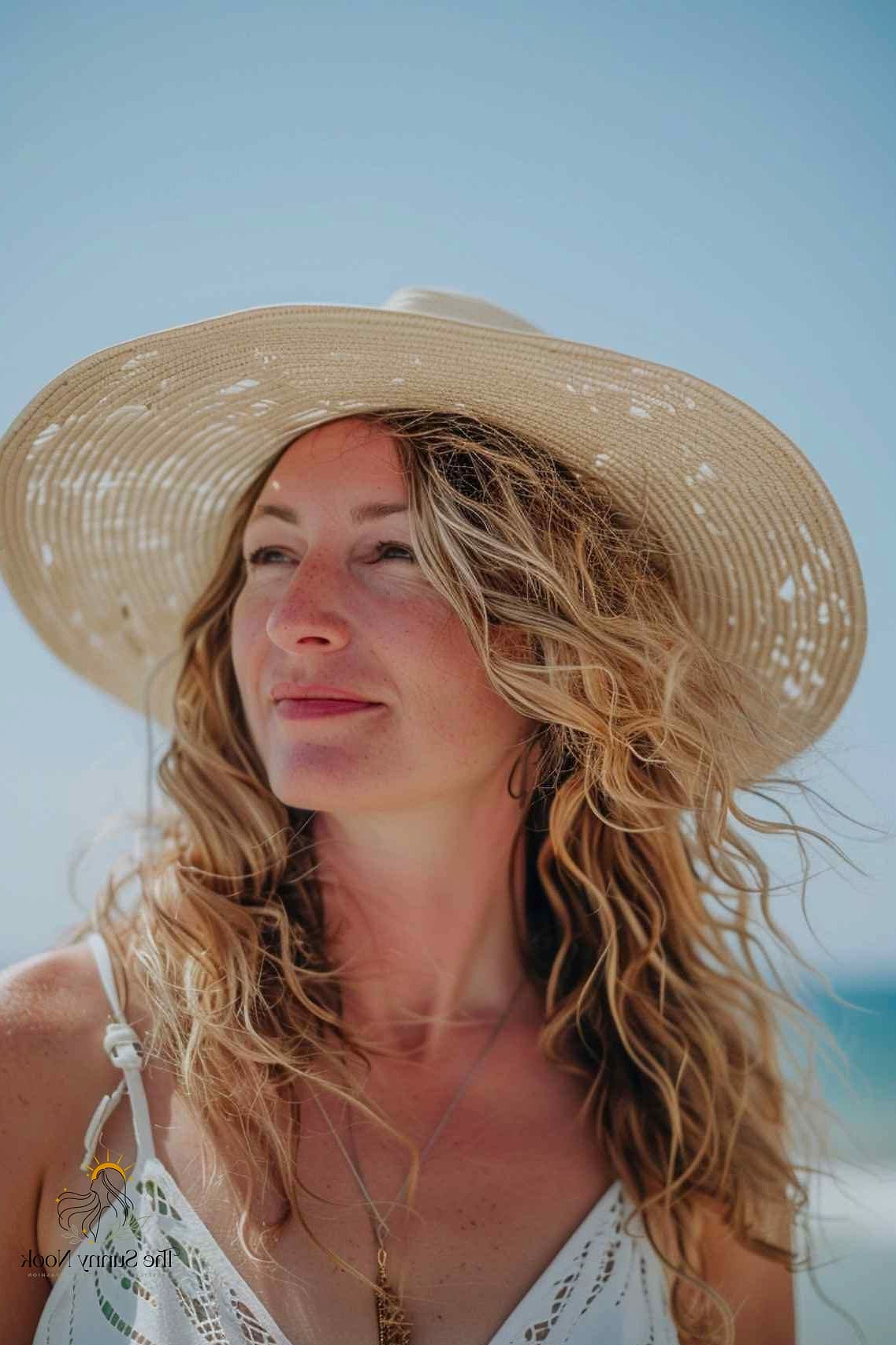 23 Cute Hat Hairstyles That Are Trending on Pinterest This Week 5 Loose Beach Waves Peeking From a Fedora