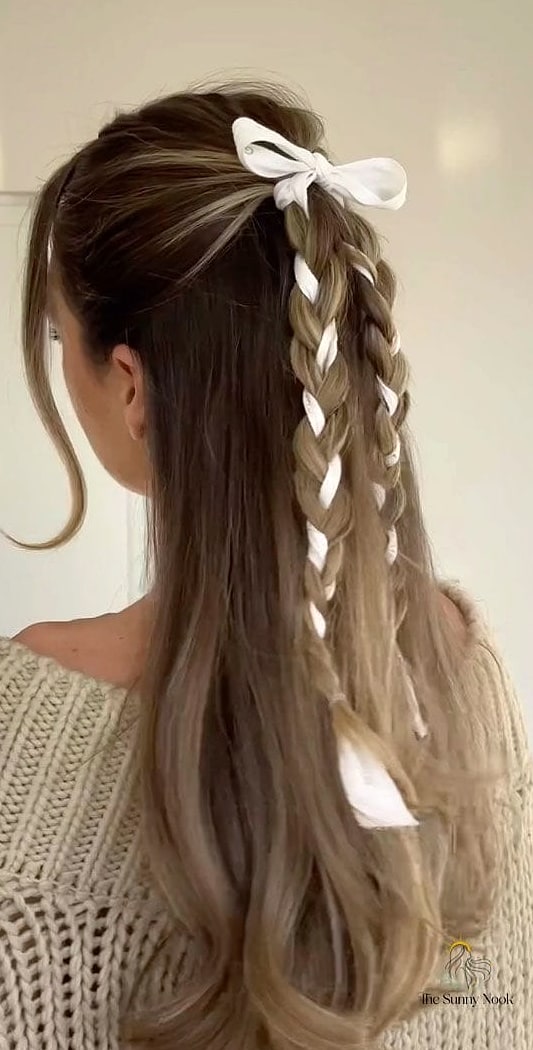 25 Cute Hairstyles With A Bow Everyone Is Pinning Right Now 24 Loose Bow Braid Down The Back