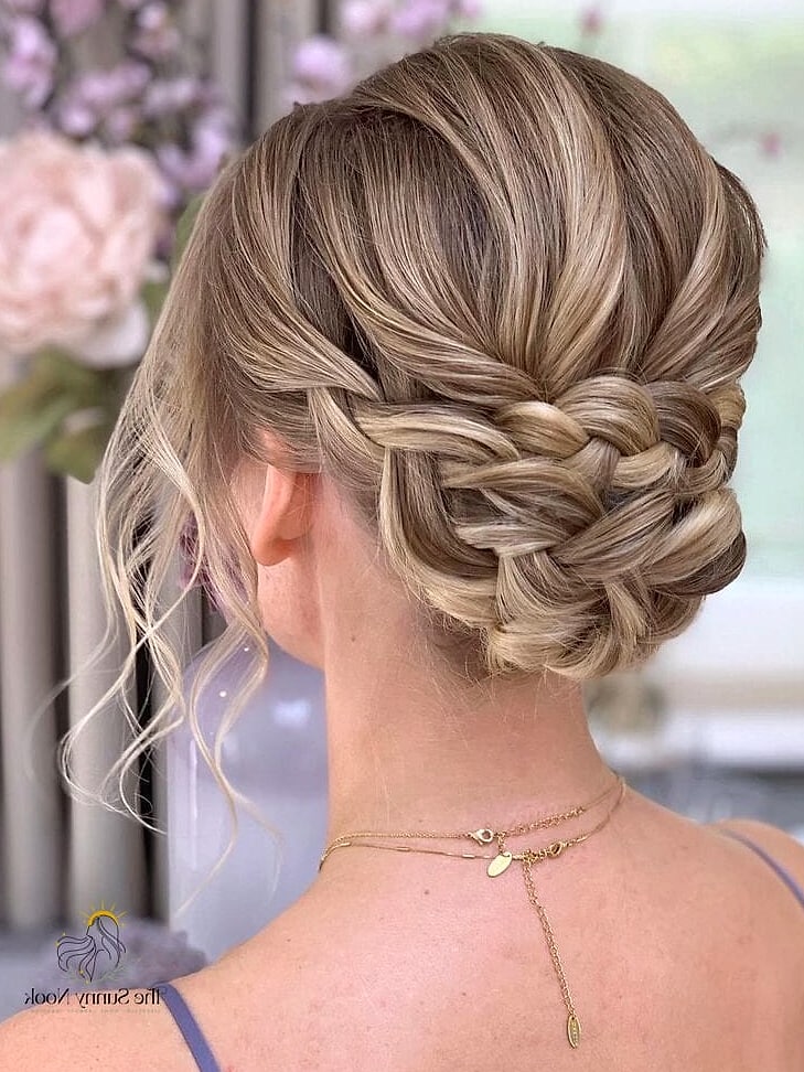 22 Elegant Hairstyles For Wedding Guest That Prove This Trend Is Here to Stay 17 Loose Braided Updo
