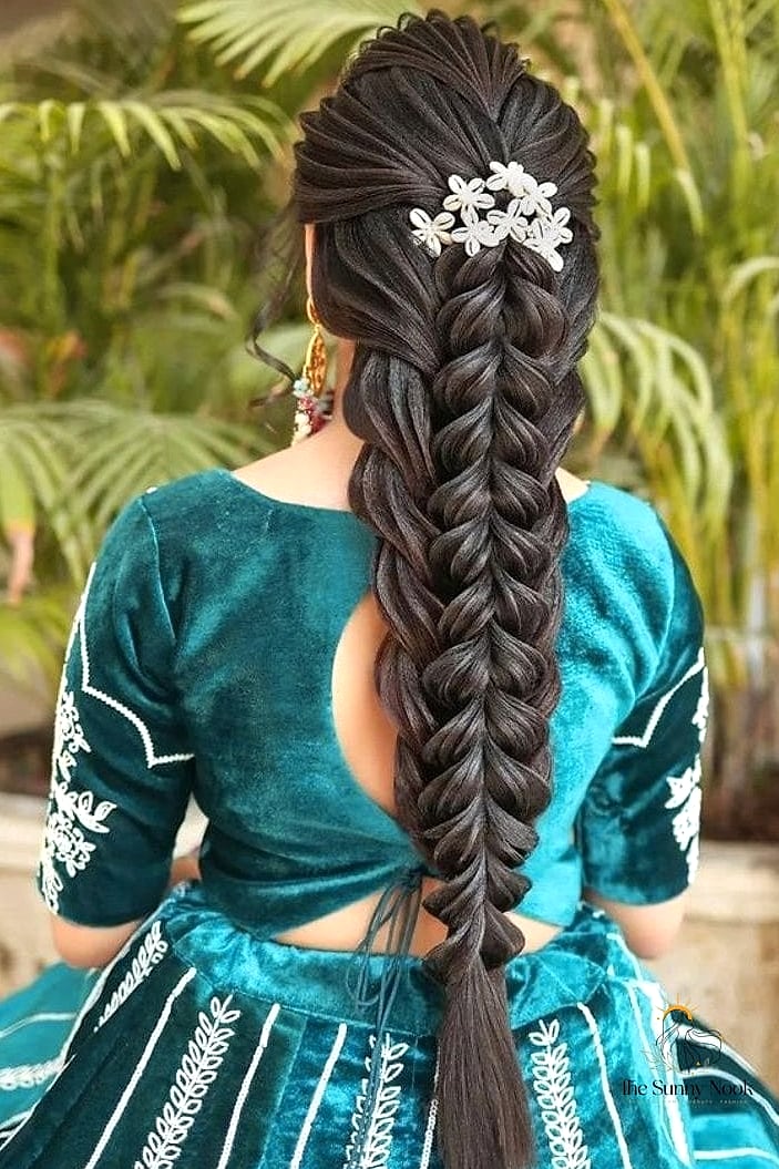 20 Indian Wedding Guest Hairstyles Inspo That's Giving Us Everything 20 Loose French Braid with Metallic Hair Cuffs