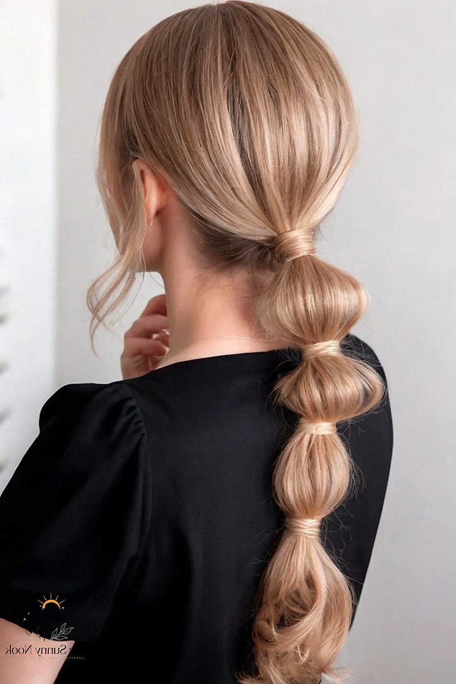 18 Easy Ponytail Hairstyles for When You Need a Fresh Change 15 The Low Bubble Braid Pony
