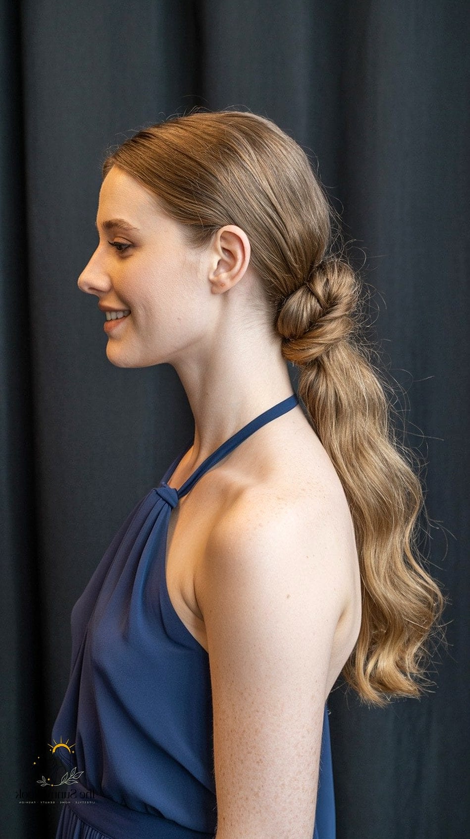 Low Twisted Bun With Braid Wrap
