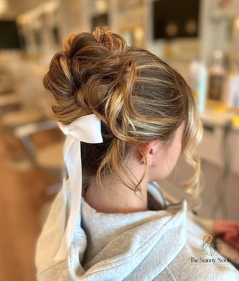25 Cute Hairstyles With A Bow Everyone Is Pinning Right Now 12 Messy Bun With An Oversized Bow