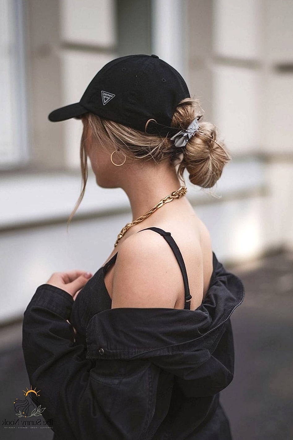 Messy Bun Peeking Through a Beanie