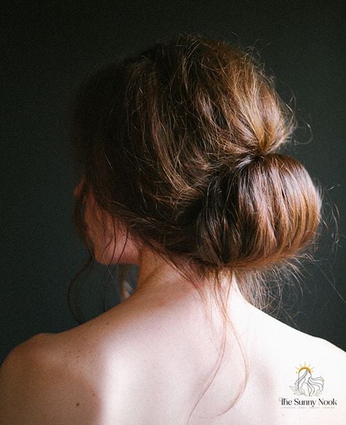 18 Messy Updo Hairstyles That Belong on Your Inspiration Board 7 Messy Low Rolled Bun
