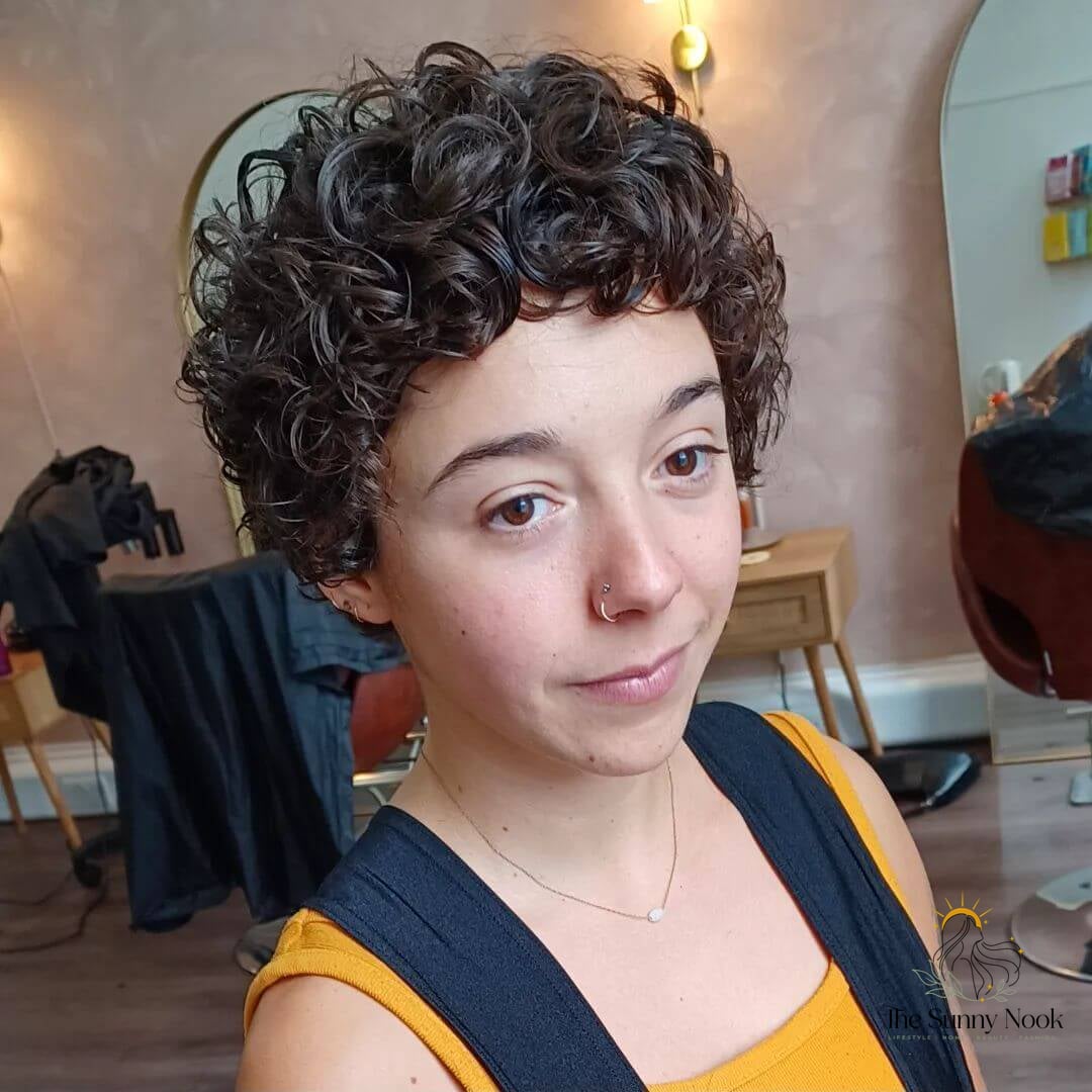 10 Natural Hairstyles Short Hair You'll Want to Re-Create Immediately 9 Playful Curly Pixie Cut with Natural Volume