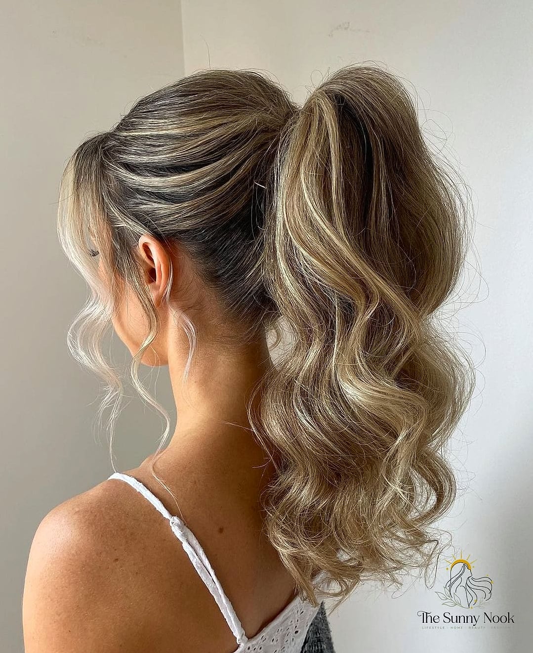 17 Bridesmaid Hairstyles For Short Hair That Are Both Cute and Low Maintenance 13 Sleek High Ponytail With Bob Extensions