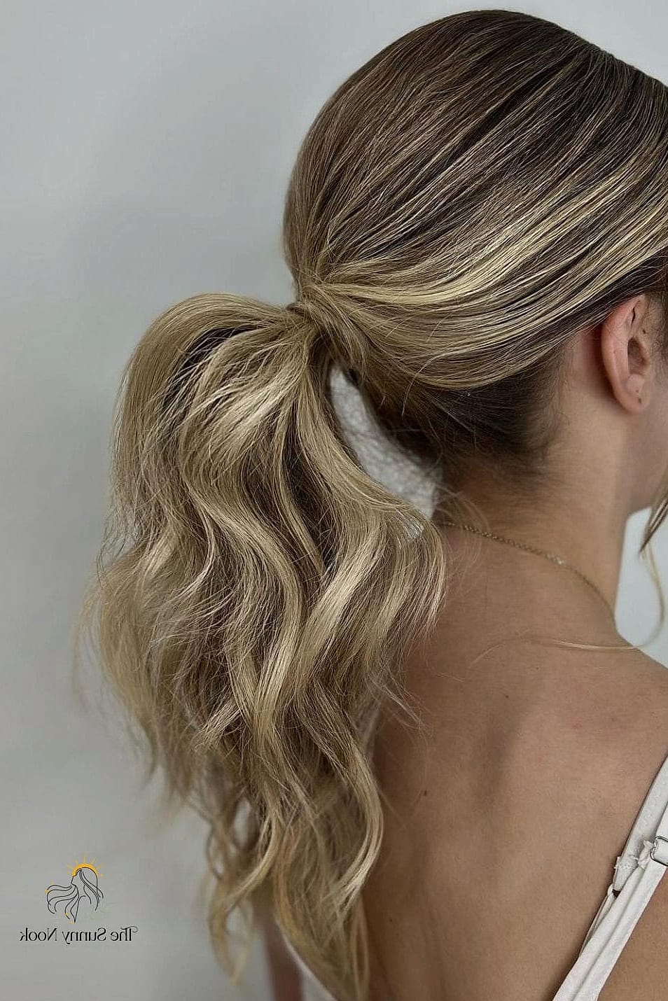 22 Cute Down Hairstyles Perfect for Your Next Salon Appointment 10 Sleek Low Ponytail Alternative: Down with a Deep Side Part