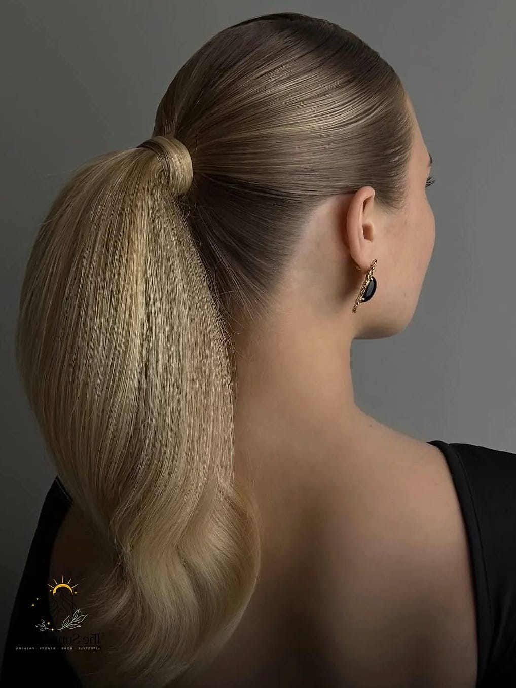 15 Sleek Hairstyles Straight Hair That Are Both Cute and Low Maintenance 11 Sleek Ponytail With Wrapped Hair Tie