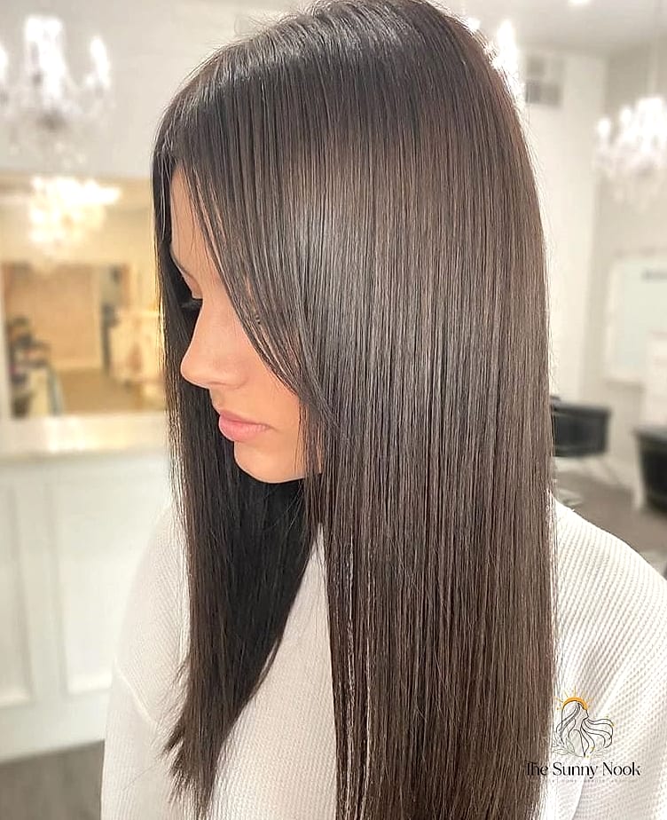Sleek Straight Hair with a Deep Side Part