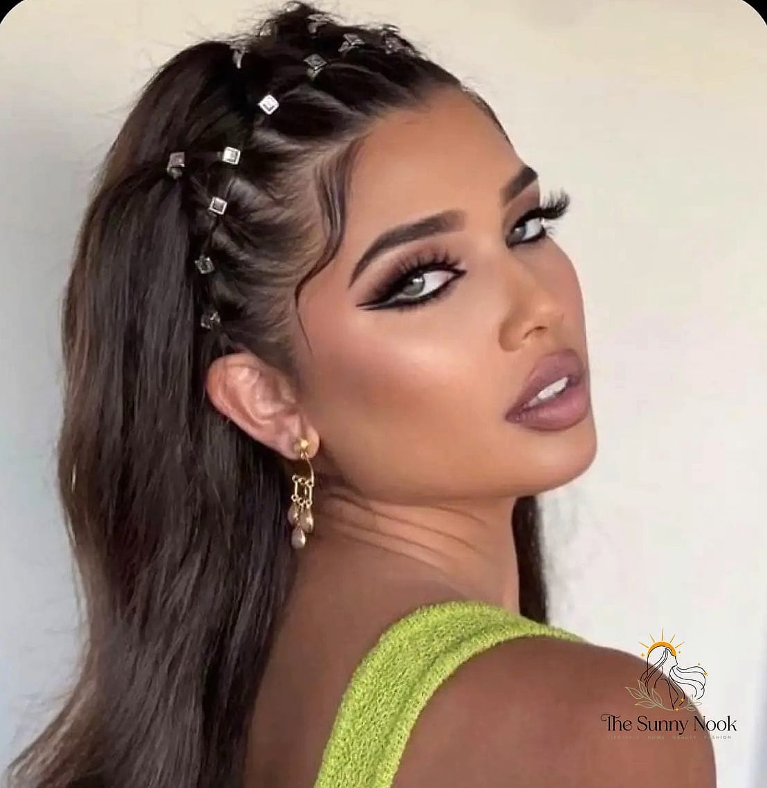21 Cute Y2K Hairstyles Inspo That's Giving Us Everything 12 Slicked-Back Ponytail with a Bump