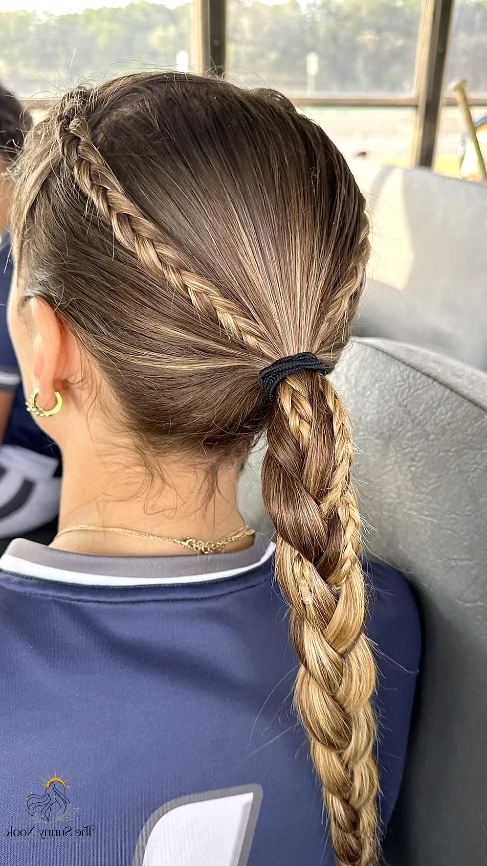 The Slicked-Back Bun with Baby Hairs