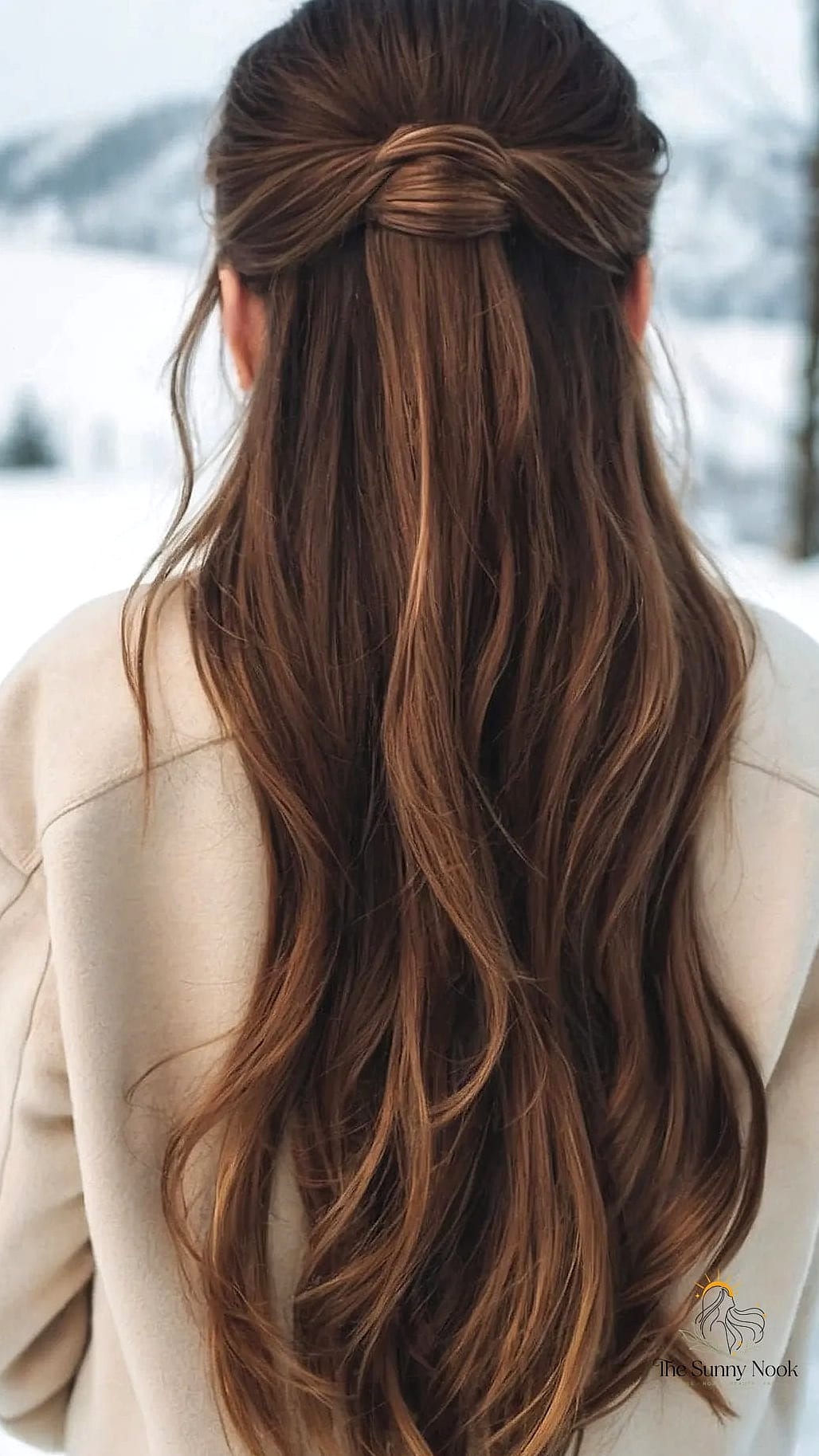 14 Cute Winter Hairstyles We're Obsessed With Right Now 4 Slicked-Back Low Bun