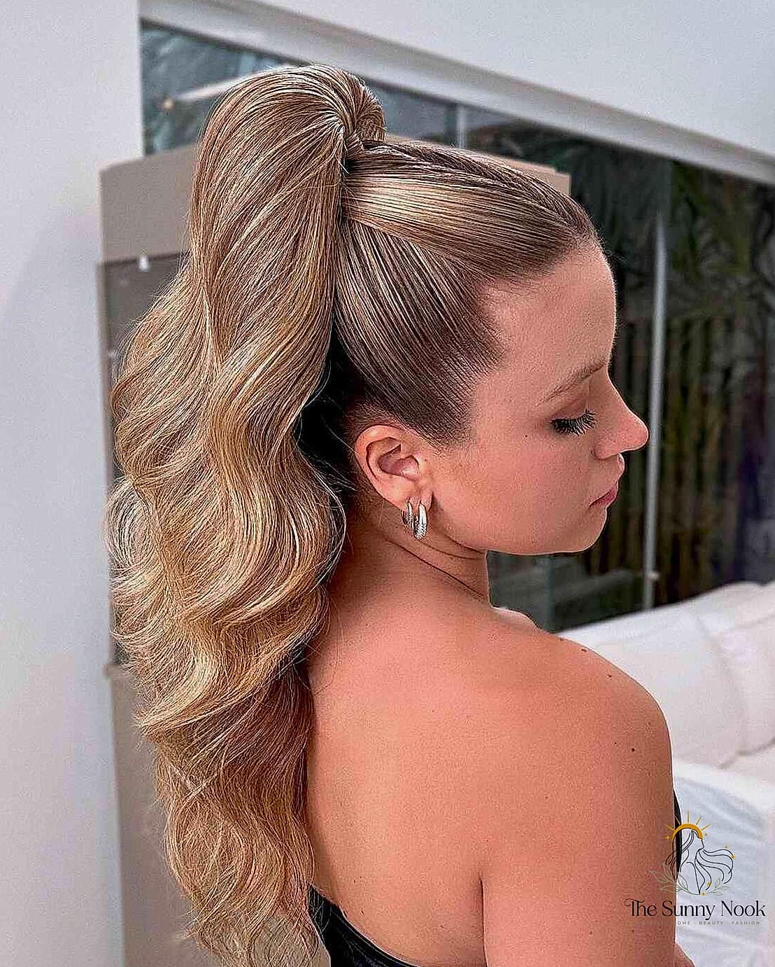 7 Short Updo Hairstyles Easy Inspo That's Giving Us Everything 9 Slicked-Back Bob with a Middle Part