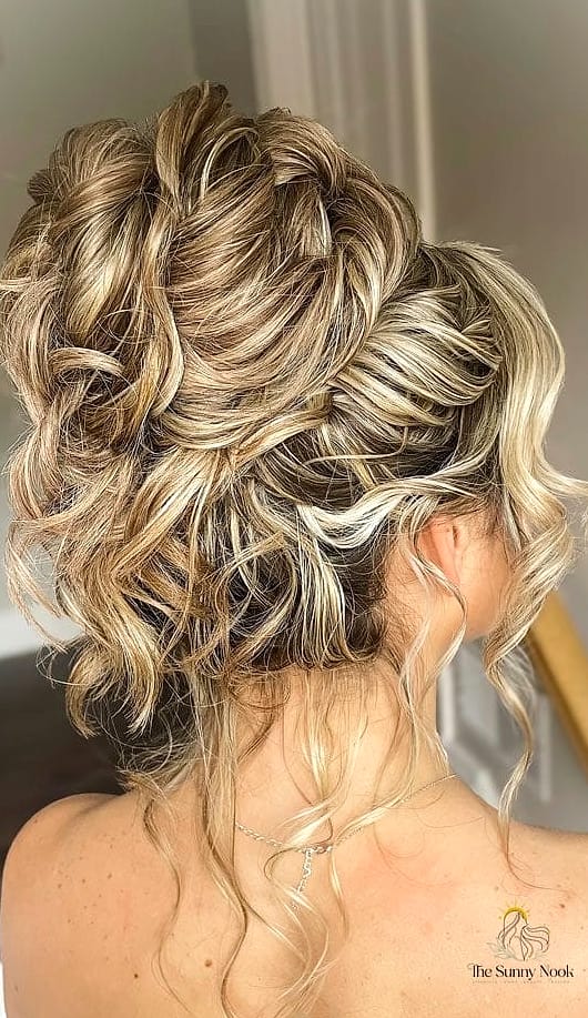 18 Messy Updo Hairstyles That Belong on Your Inspiration Board 10 Textured High Bun with Loose Tendrils