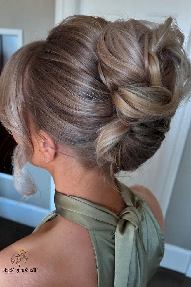 23 Updo Hairstyles For Prom Everyone Is Pinning Right Now 9 Textured Low Updo with Volume at the Crown