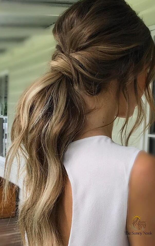 18 Easy Ponytail Hairstyles for When You Need a Fresh Change 7 The Textured Low Pony