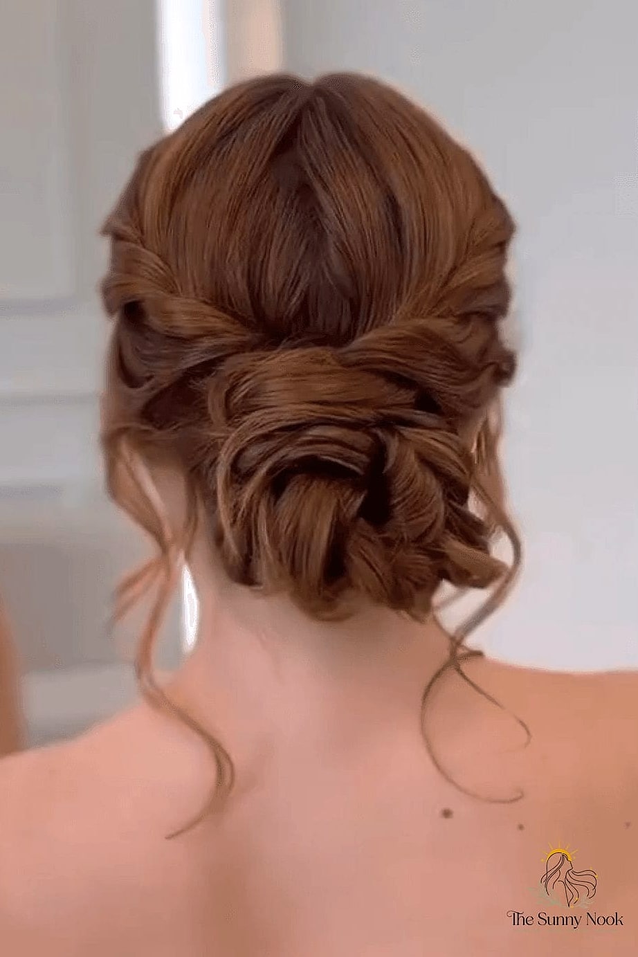 11 Prom Hairstyles Bun for When You Need a Fresh Change 3 Textured Top Knot with Face-Framing Pieces