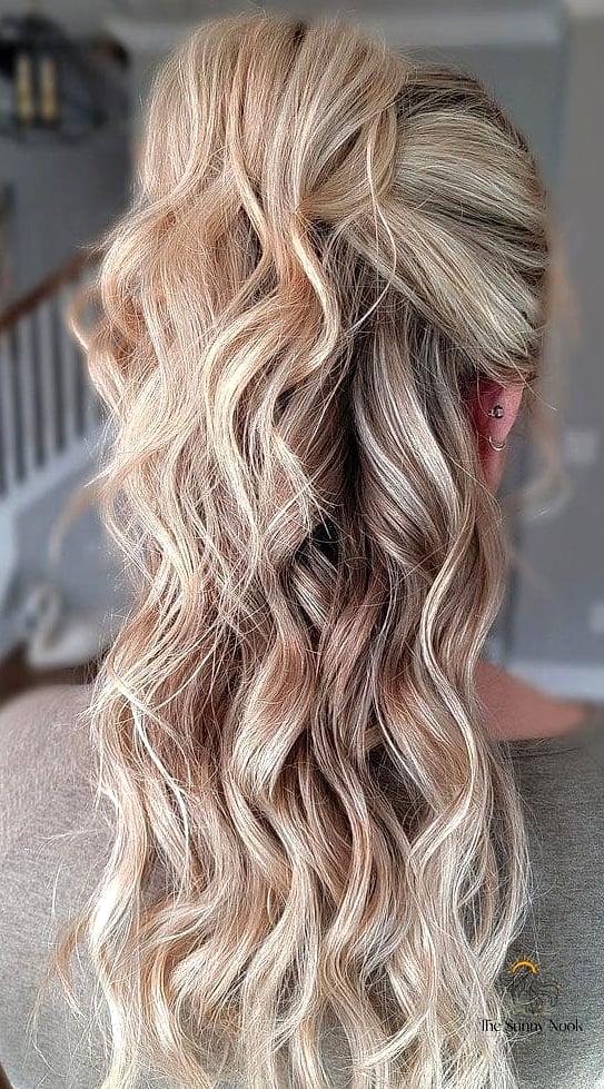 22 Cute Down Hairstyles Perfect for Your Next Salon Appointment 22 Tousled Waves with a Deep Side Part