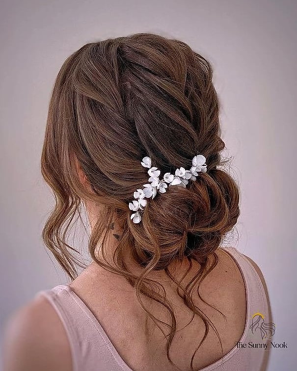 18 Messy Updo Hairstyles That Belong on Your Inspiration Board 11 Undone Braided Crown Updo