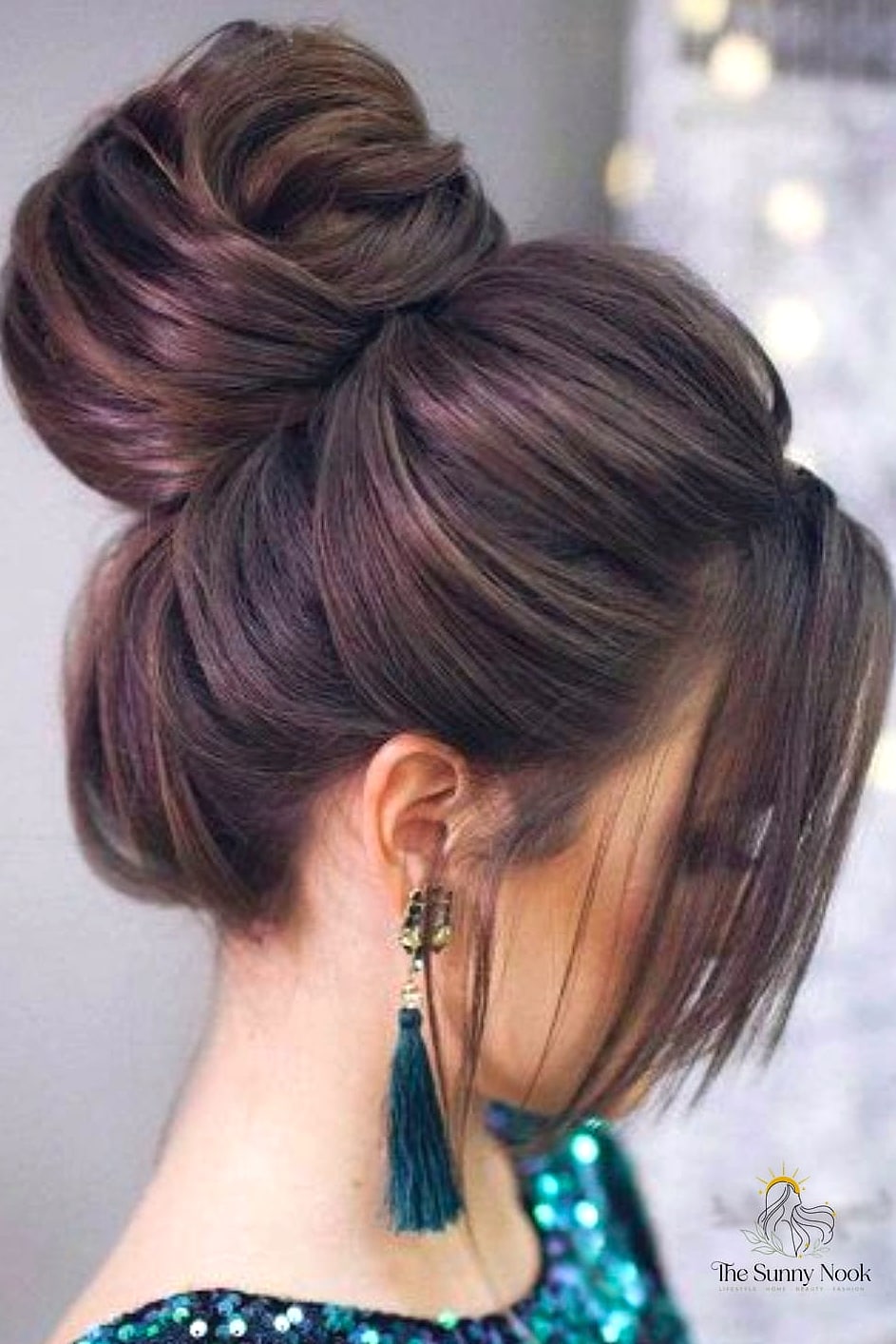16 Professional Hairstyles For Work That Prove This Trend Is Here to Stay 11 The Voluminous Blowout Bun