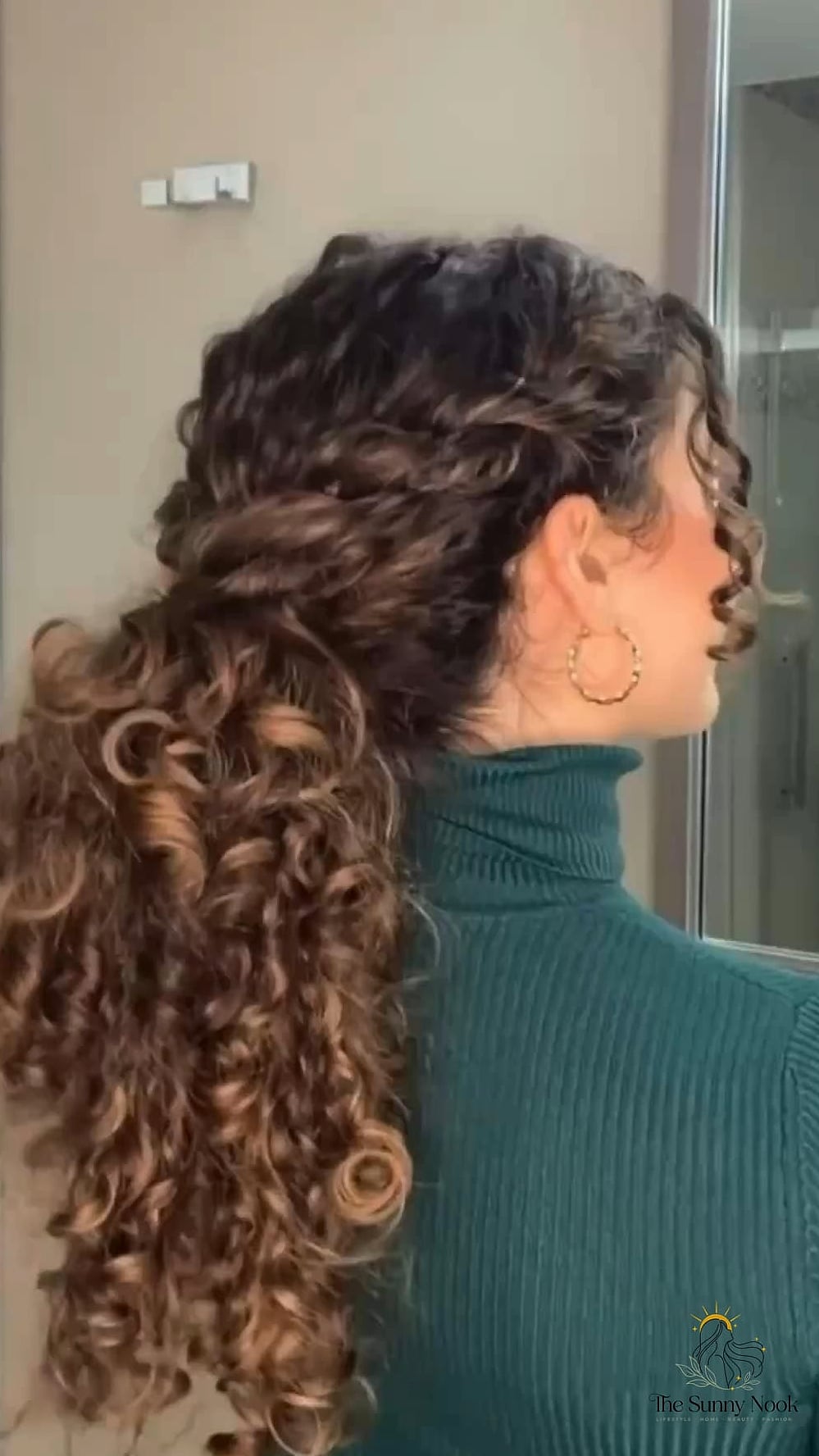 21 Simple Ponytail Hairstyles to Show Your Stylist ASAP 19 Voluminous Curly Low Pony